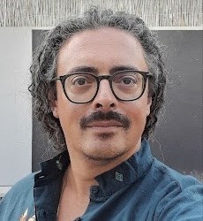 Cosmo Lupo, Associate Editor